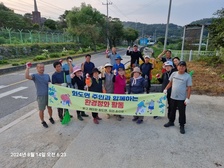 화도면 주민자치위원회, 가로화단 환경정비 나서