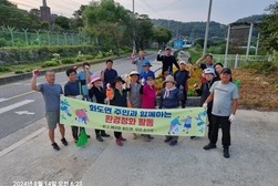 화도면 주민자치위원회, 가로화단 환경정비 나서